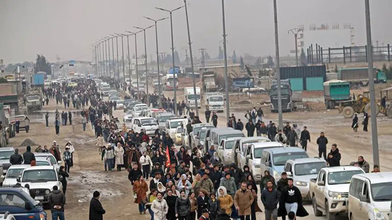 Halep’te Kürt sürgünü kameralara yansıyor